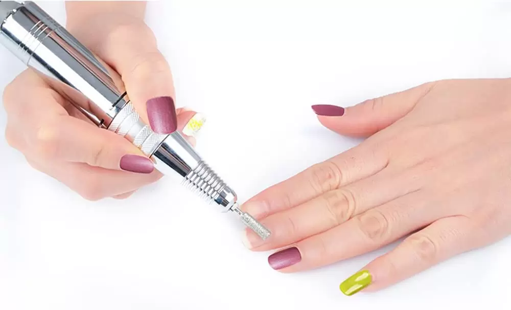 Electric Nail Drill 35000 RPM For Manicure and Nail Art Fast Heat Distribution with 4 Nail Drill Bits Long Service Life for Right-handed or Left-handed Users Electric Nail Drill 35000 RPM For Manicure and Nail Art Fast Heat Distribution with 4 Nail Drill Bits Long Service Life for Right-handed or Left-handed Users